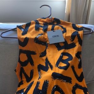 High collar orange and black midi dress